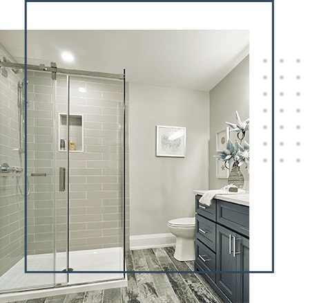 A renovations example bathroom with a shower, toilet and sink.