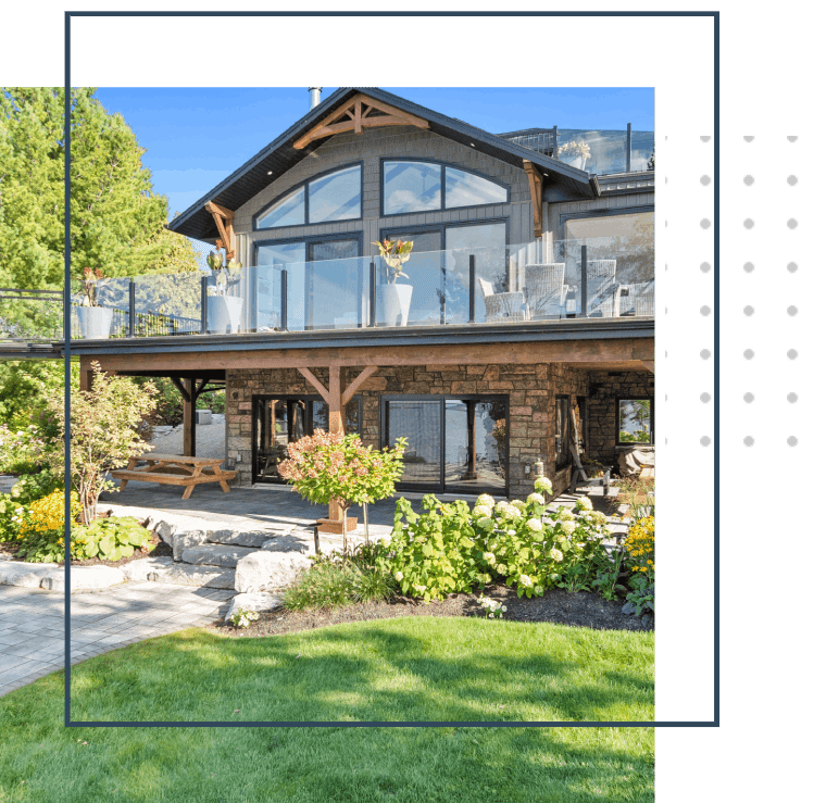 A large house with a big lawn in front of it