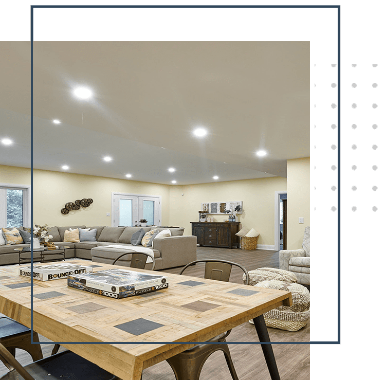 A basements example room with a table and many chairs